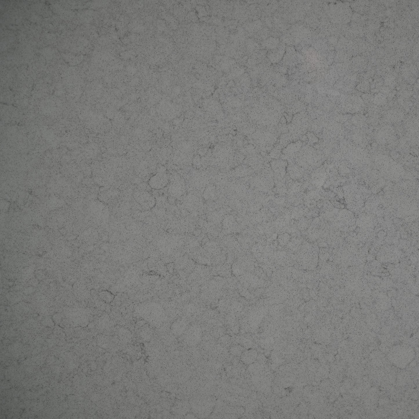 Grey engineered quartz stone benchtop with cool grey base and subtle broken marble veining — honed finish, 20mm custom cut vanity top