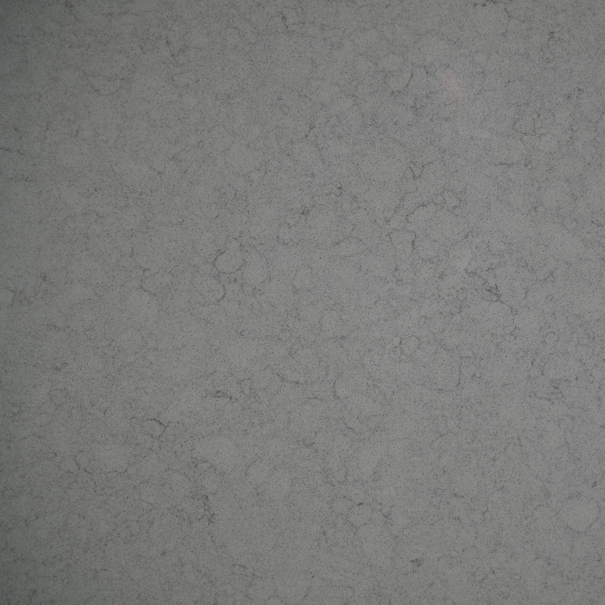 Grey engineered quartz stone benchtop with cool grey base and subtle broken marble veining — honed finish, 20mm custom cut vanity top