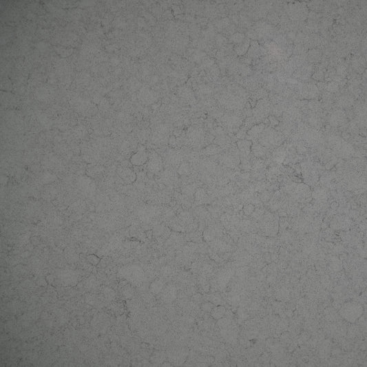 Grey engineered quartz stone benchtop with cool grey base and subtle broken marble veining — honed finish, 20mm custom cut vanity top